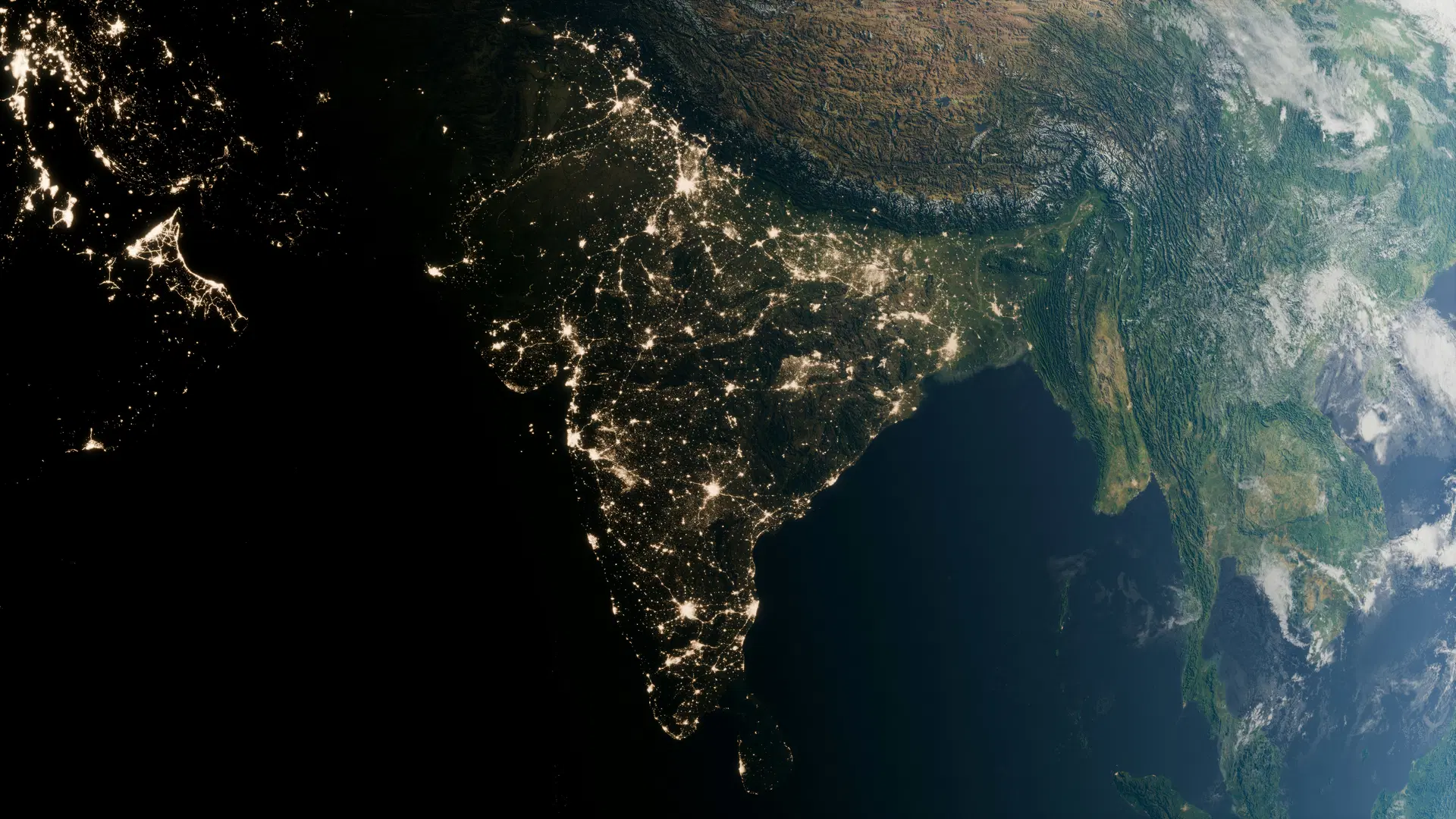 Satellite view of India at night showing illuminated cities